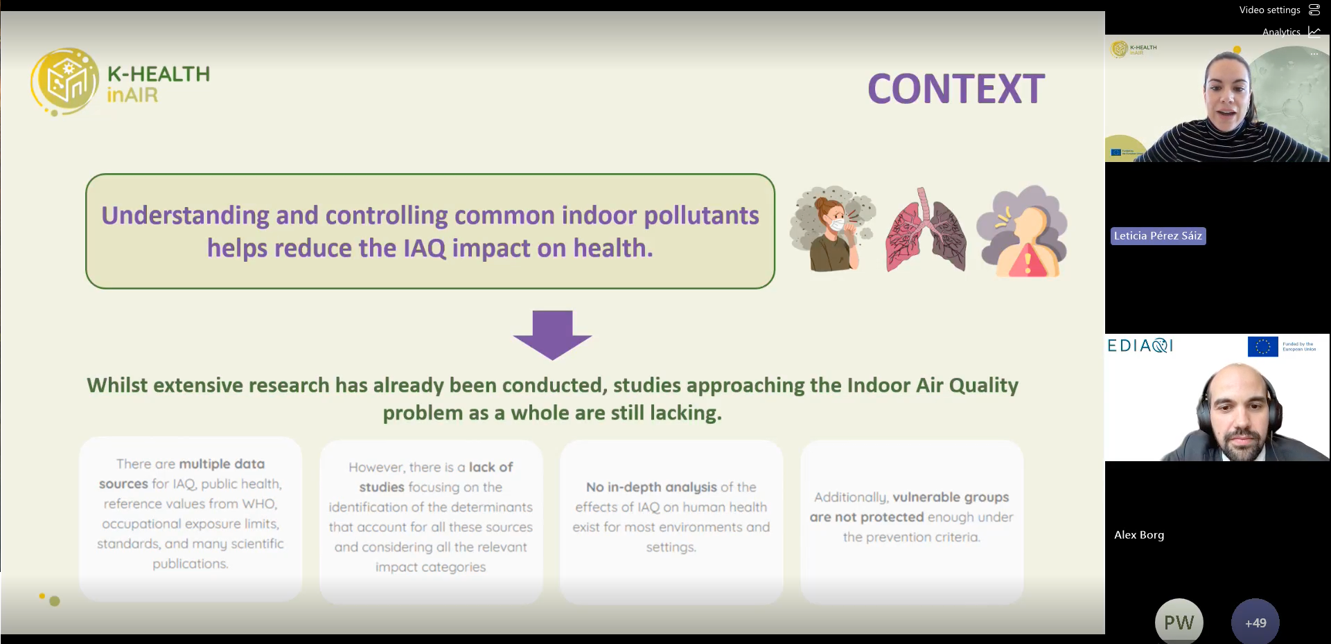 Slide titled “Context” from the K-HEALTHinAIR project. The slide explains that understanding and controlling common indoor pollutants helps reduce the health impacts of indoor air quality. It highlights that, despite extensive existing research, holistic studies addressing indoor air quality as an integrated problem remain limited. Four boxes outline key gaps, including fragmented data sources, lack of determinant-focused studies, insufficient in-depth analysis of health effects across environments, and inadequate protection of vulnerable groups. Illustrative icons depict respiratory health impacts. On the right, webinar speaker video windows are visible, with EDIAQI and European Union funding logos displayed.