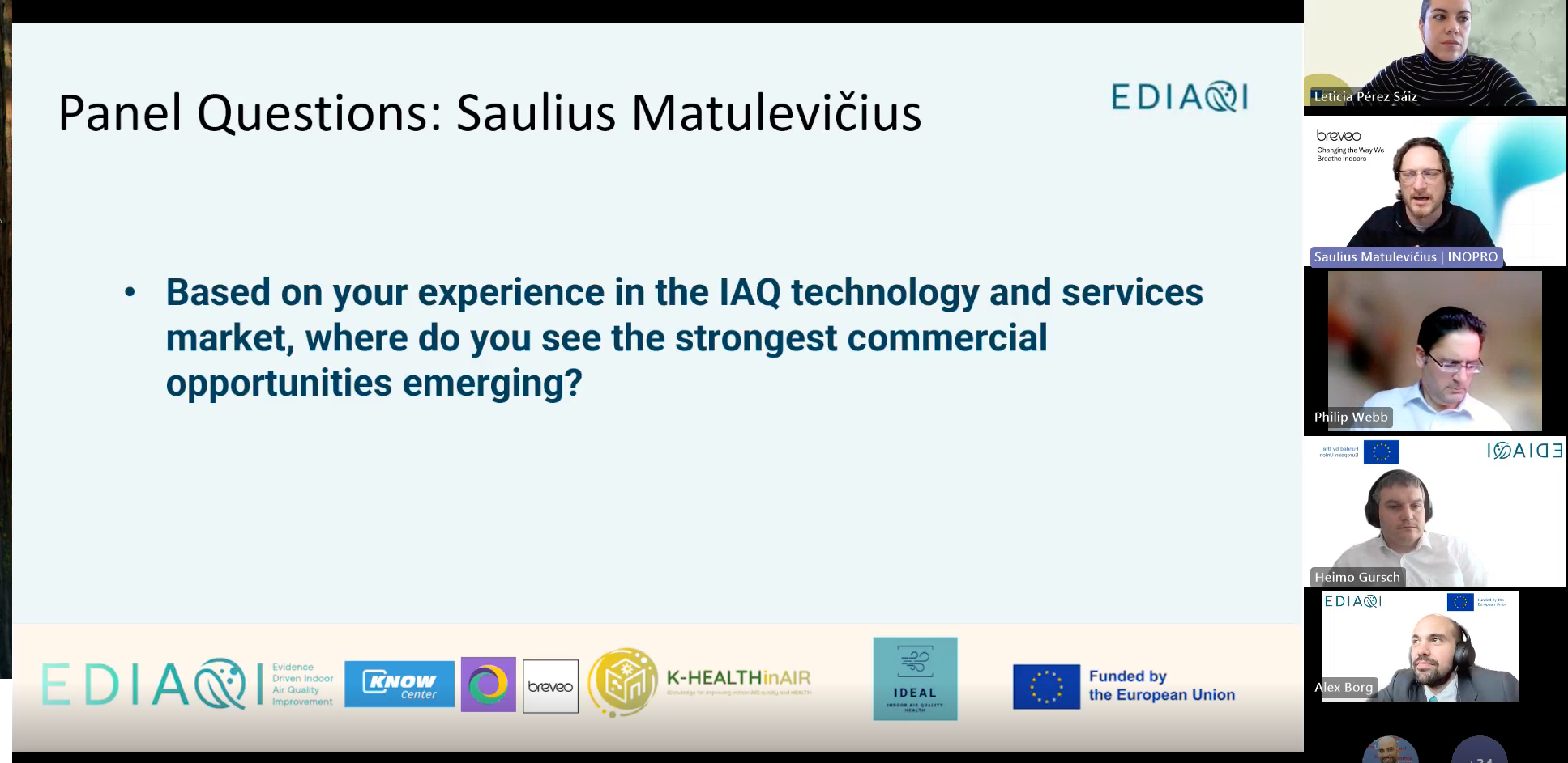 Slide titled “Panel Questions: Saulius Matulevičius”. The slide displays a discussion question asking where the strongest commercial opportunities are emerging in the indoor air quality technology and services market, based on professional experience. On the right side, video windows show panel participants and the moderator during the EDIAQI webinar. Partner logos, including EDIAQI, KNOW Center, Breveo, K-HEALTHinAIR, IDEAL, and the European Union funding logo, are displayed along the bottom of the slide.