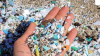 Plastic Waste and Microplastics in Human Hand 