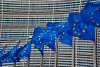 European Commission Berlaymont Building with Row of EU Flags